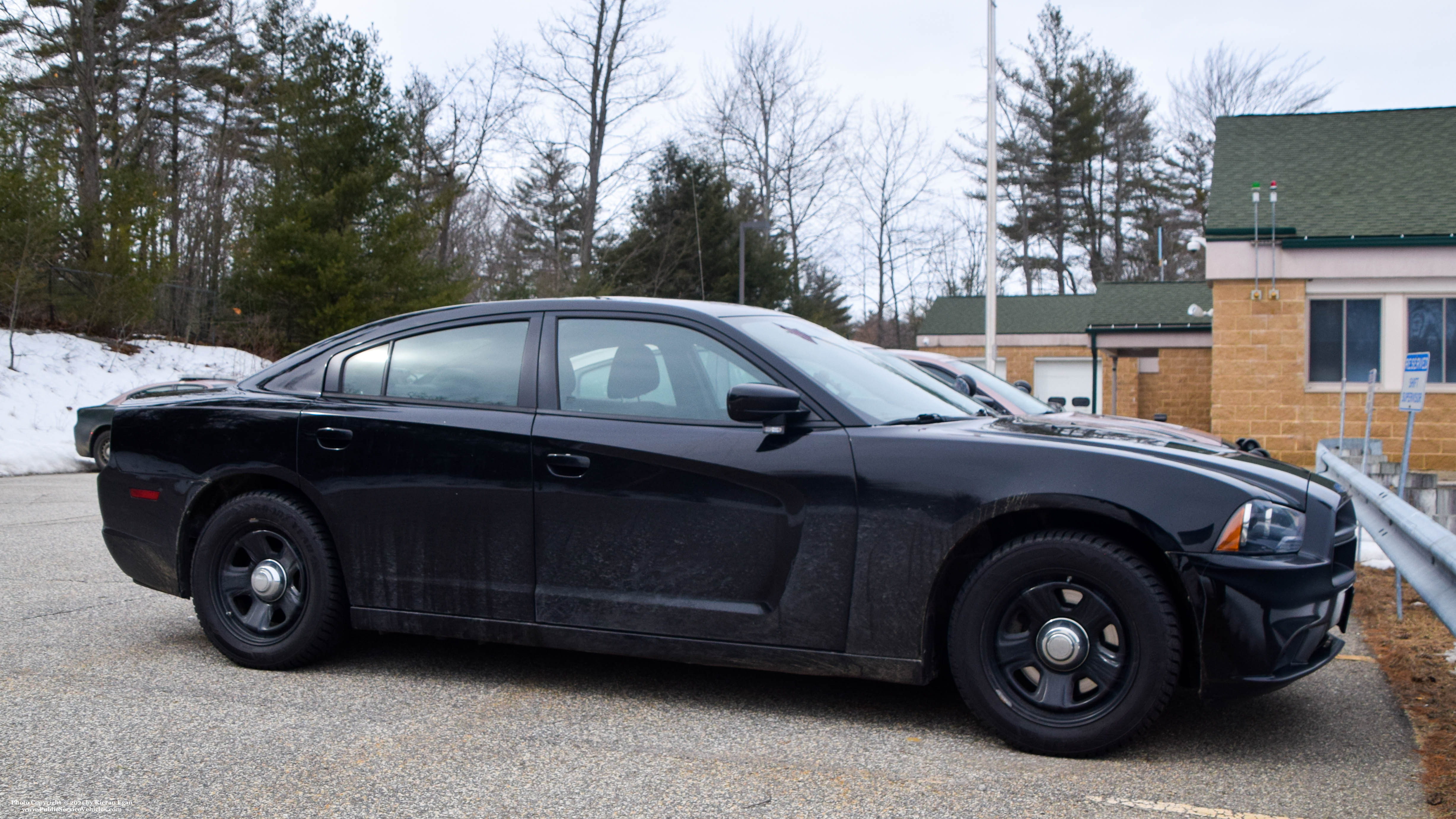 A photo  of New Hampshire State Police
            Cruiser 450, a 2011-2014 Dodge Charger             taken by Kieran Egan