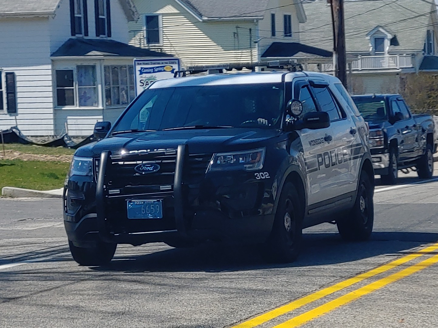 A photo  of Woonsocket Police
            Cruiser 302, a 2017 Ford Police Interceptor Utility             taken by Jamian Malo