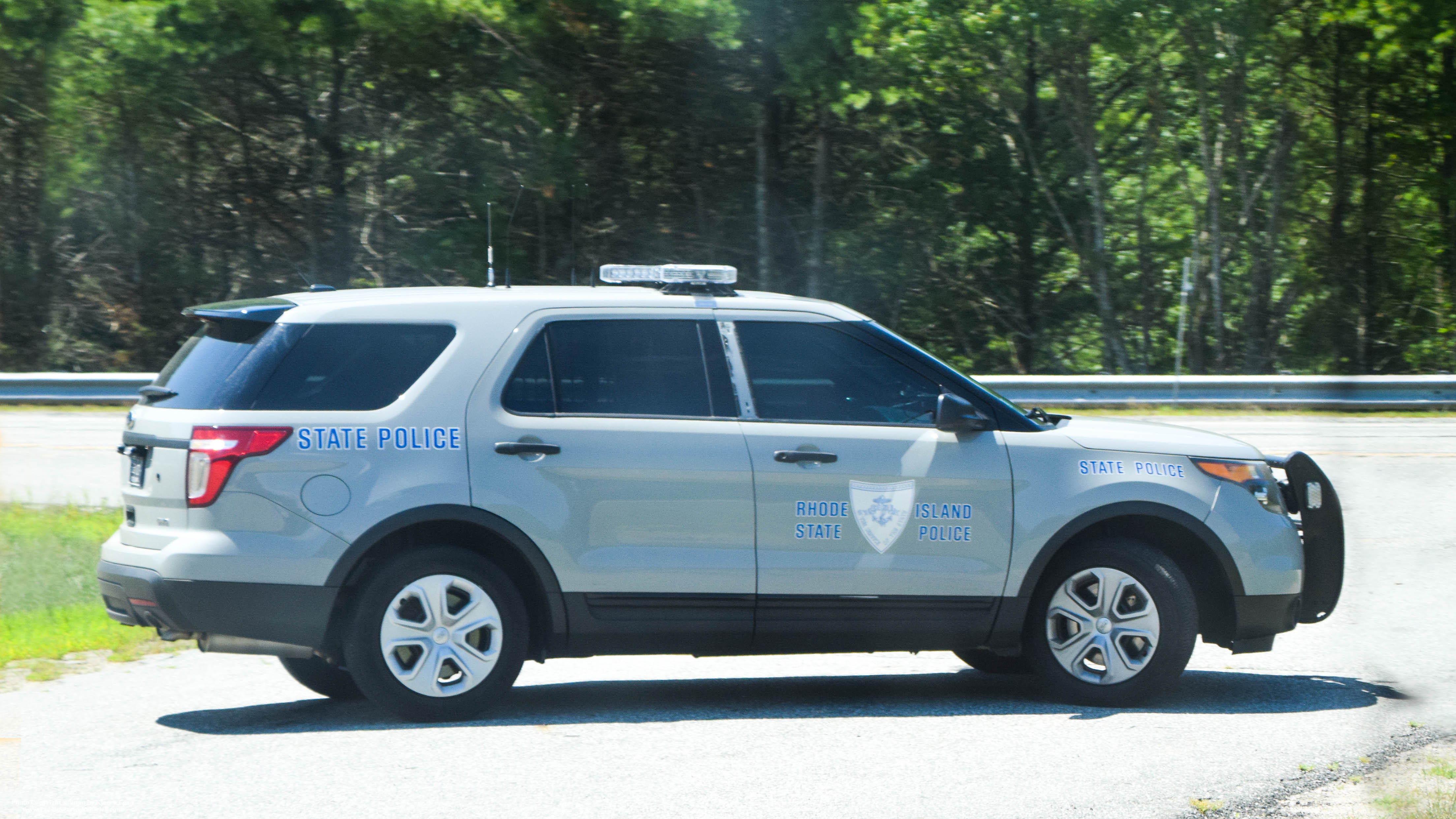 A photo  of Rhode Island State Police
            Cruiser 154, a 2013-2015 Ford Police Interceptor Utility             taken by Kieran Egan