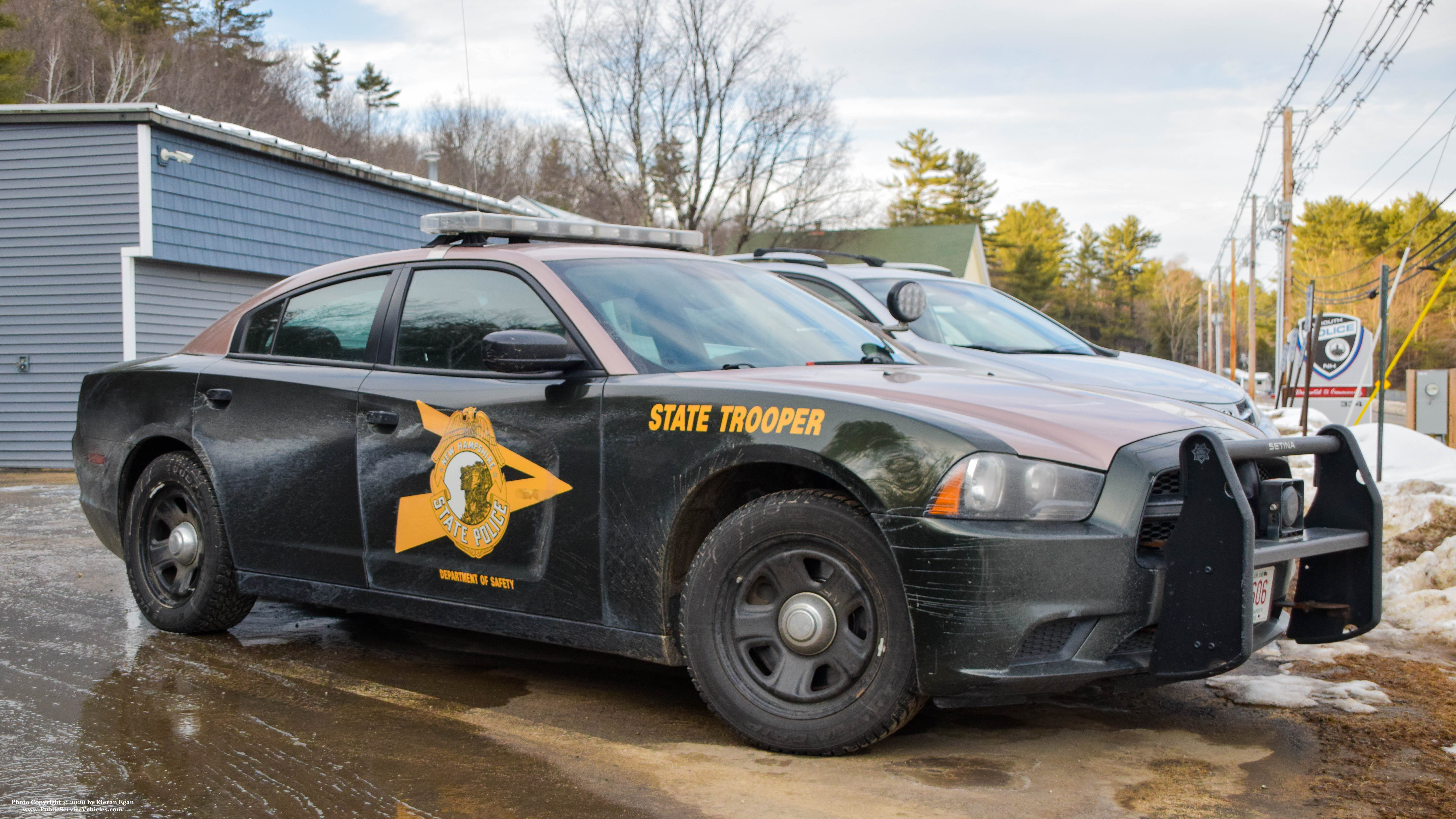 A photo  of New Hampshire State Police
            Cruiser 606, a 2011-2013 Dodge Charger             taken by Kieran Egan