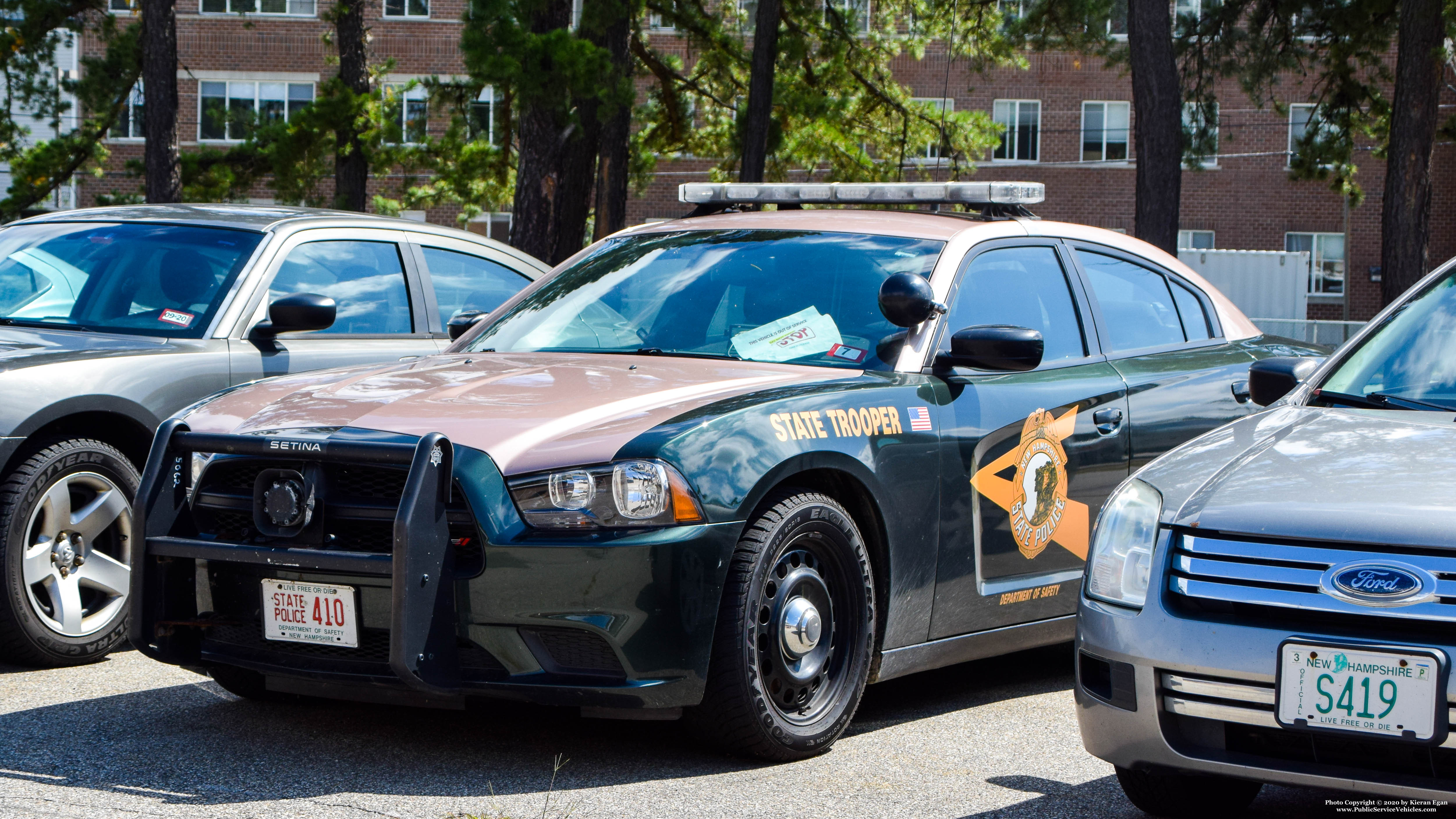 A photo  of New Hampshire State Police
            Cruiser 410, a 2011-2014 Dodge Charger             taken by Kieran Egan
