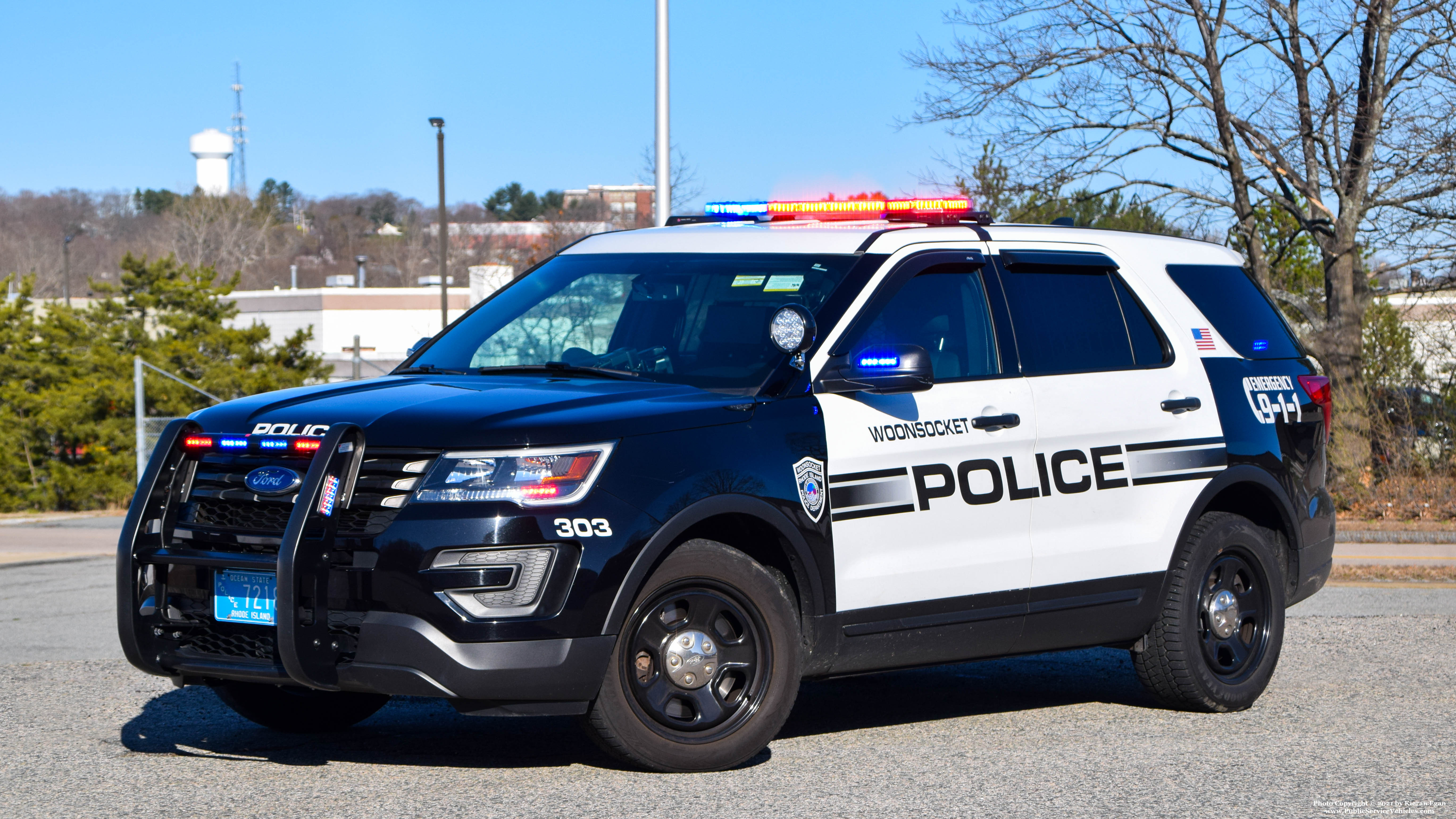 A photo  of Woonsocket Police
            Cruiser 303, a 2019 Ford Police Interceptor Utility             taken by Kieran Egan