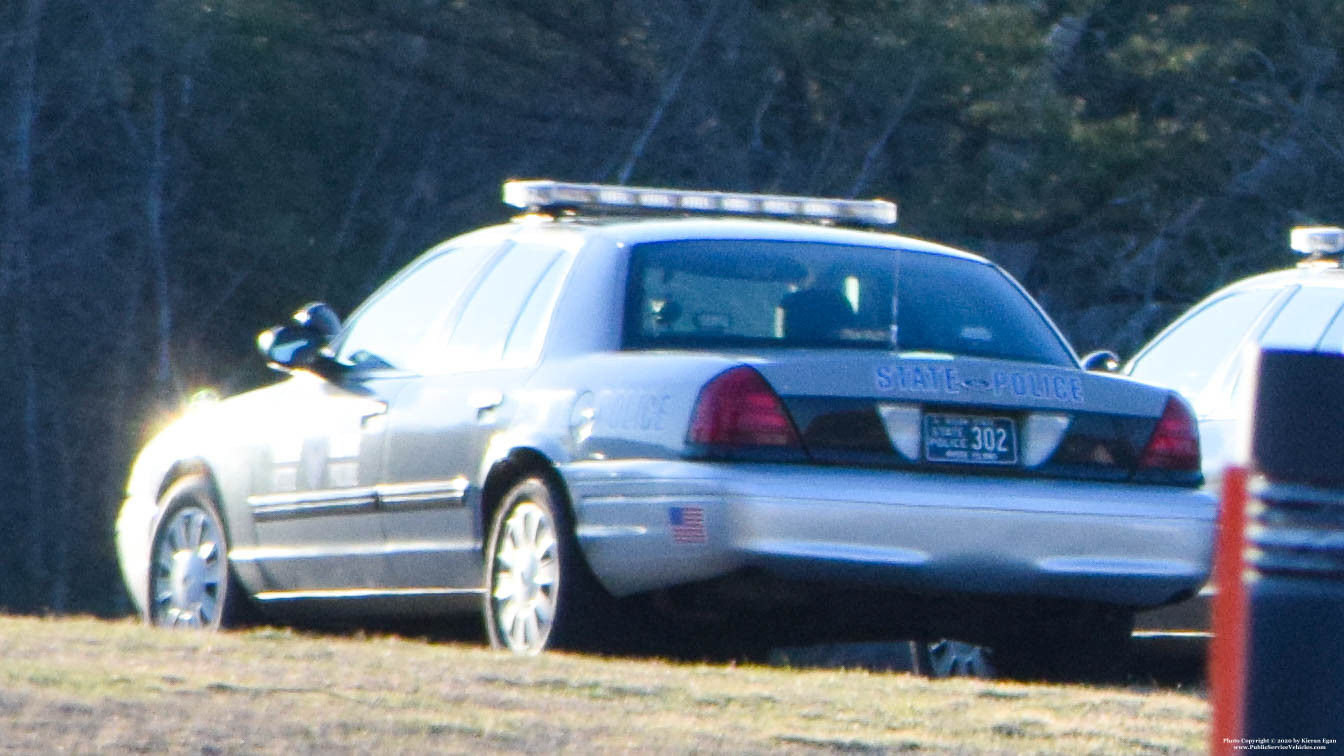 A photo  of Rhode Island State Police
            Cruiser 302, a 2009-2011 Ford Crown Victoria Police Interceptor             taken by Kieran Egan