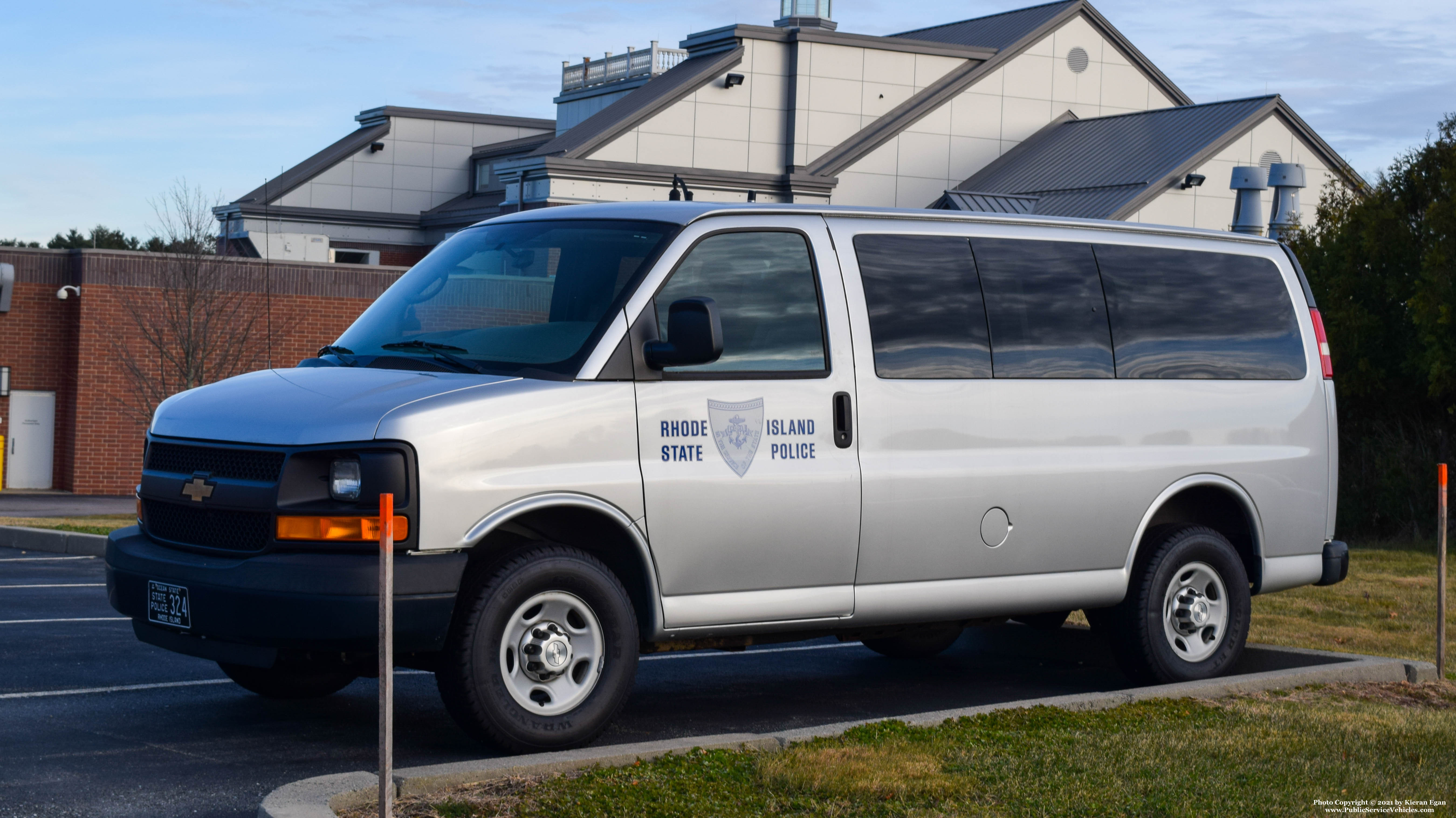 A photo  of Rhode Island State Police
            Cruiser 324, a 2003-2020 Chevrolet Express             taken by Kieran Egan