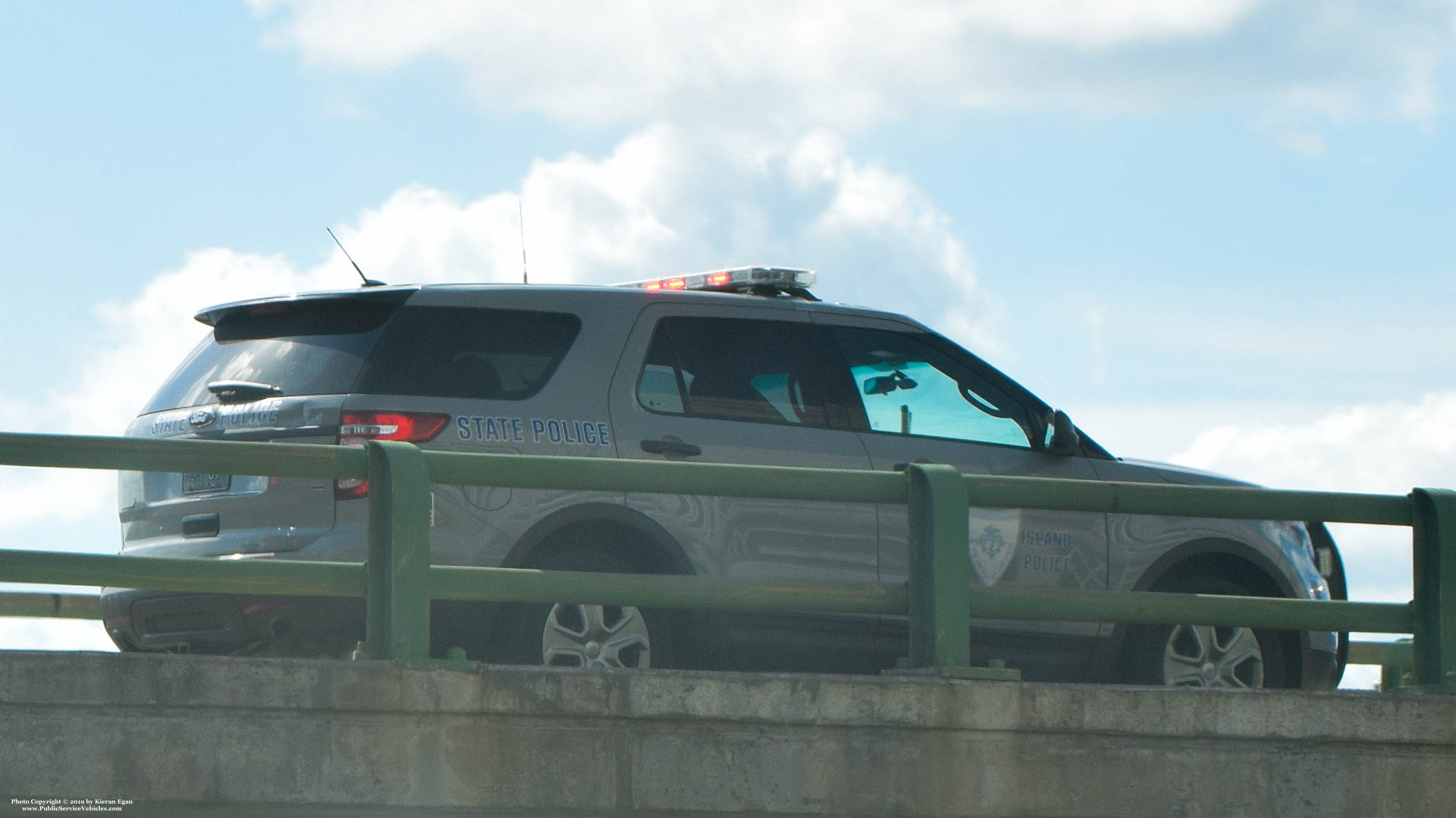 A photo  of Rhode Island State Police
            Cruiser 87, a 2013-2015 Ford Police Interceptor Utility             taken by Kieran Egan