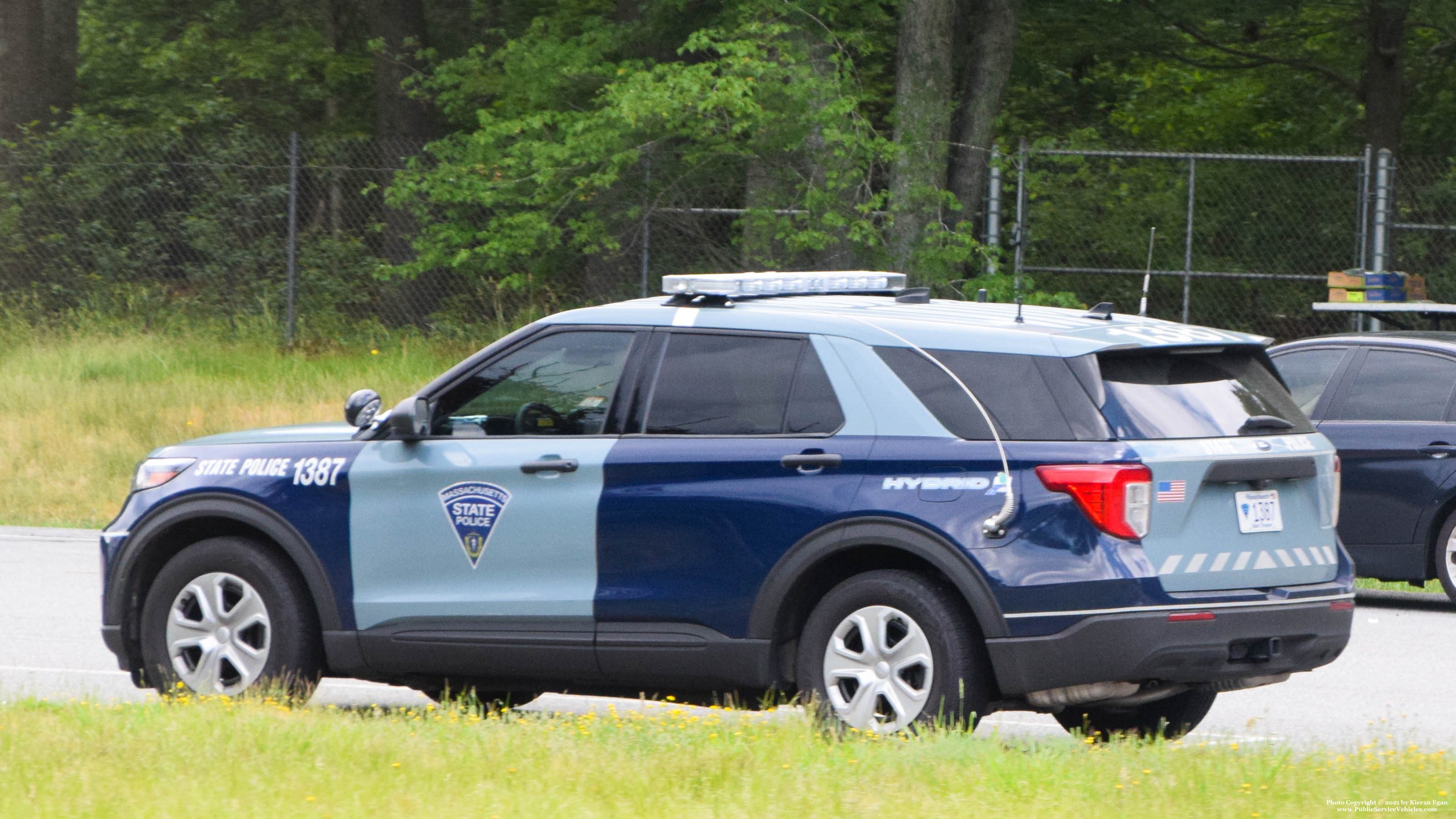 A photo  of Massachusetts State Police
            Cruiser 1387, a 2020 Ford Police Interceptor Utility Hybrid             taken by Kieran Egan