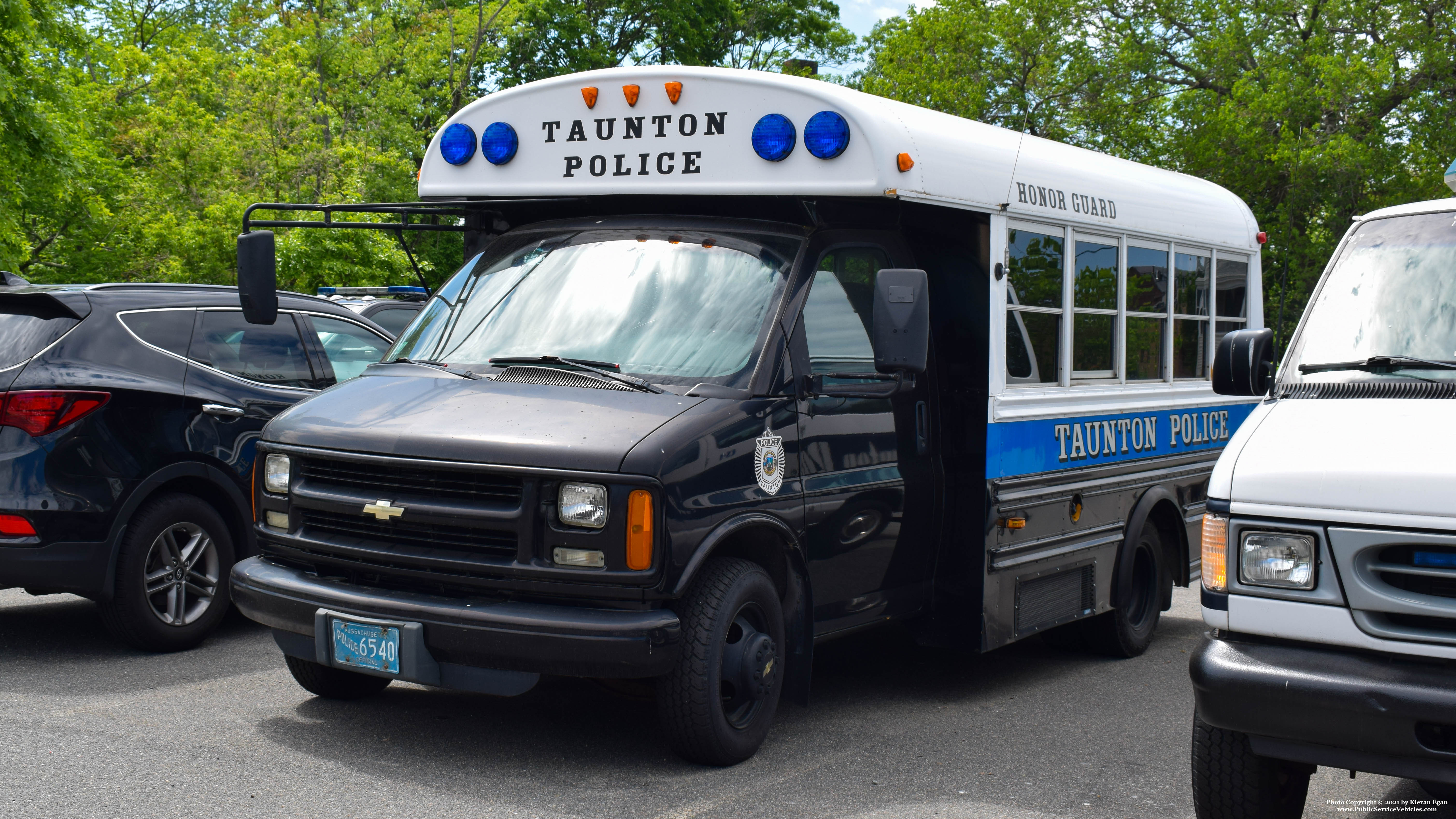 A photo  of Taunton Police
            Honor Guard Bus, a 2002 Chevrolet G30 Bus             taken by Kieran Egan
