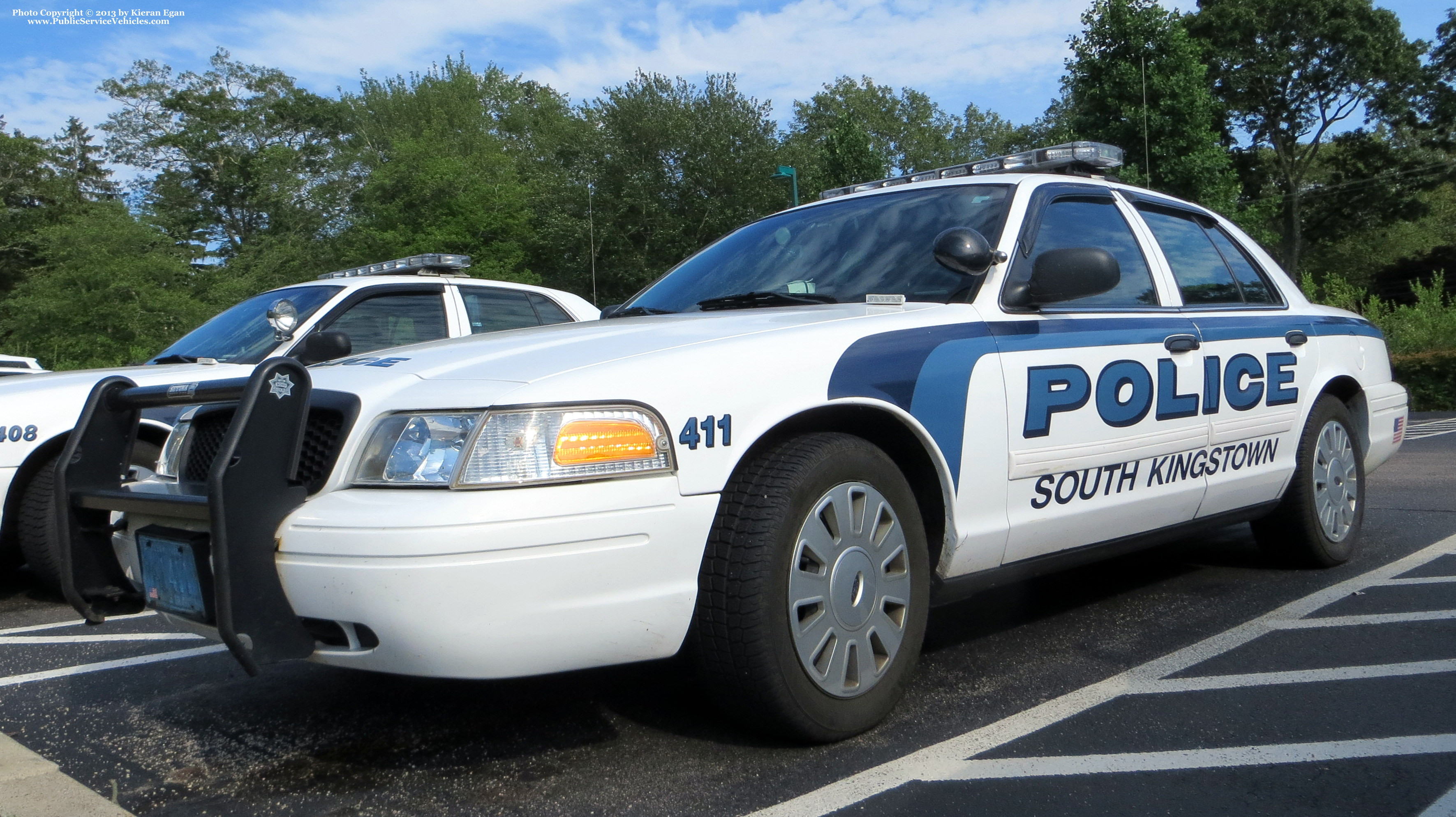 A photo  of South Kingstown Police
            Cruiser 411, a 2009-2011 Ford Crown Victoria Police Interceptor             taken by Kieran Egan