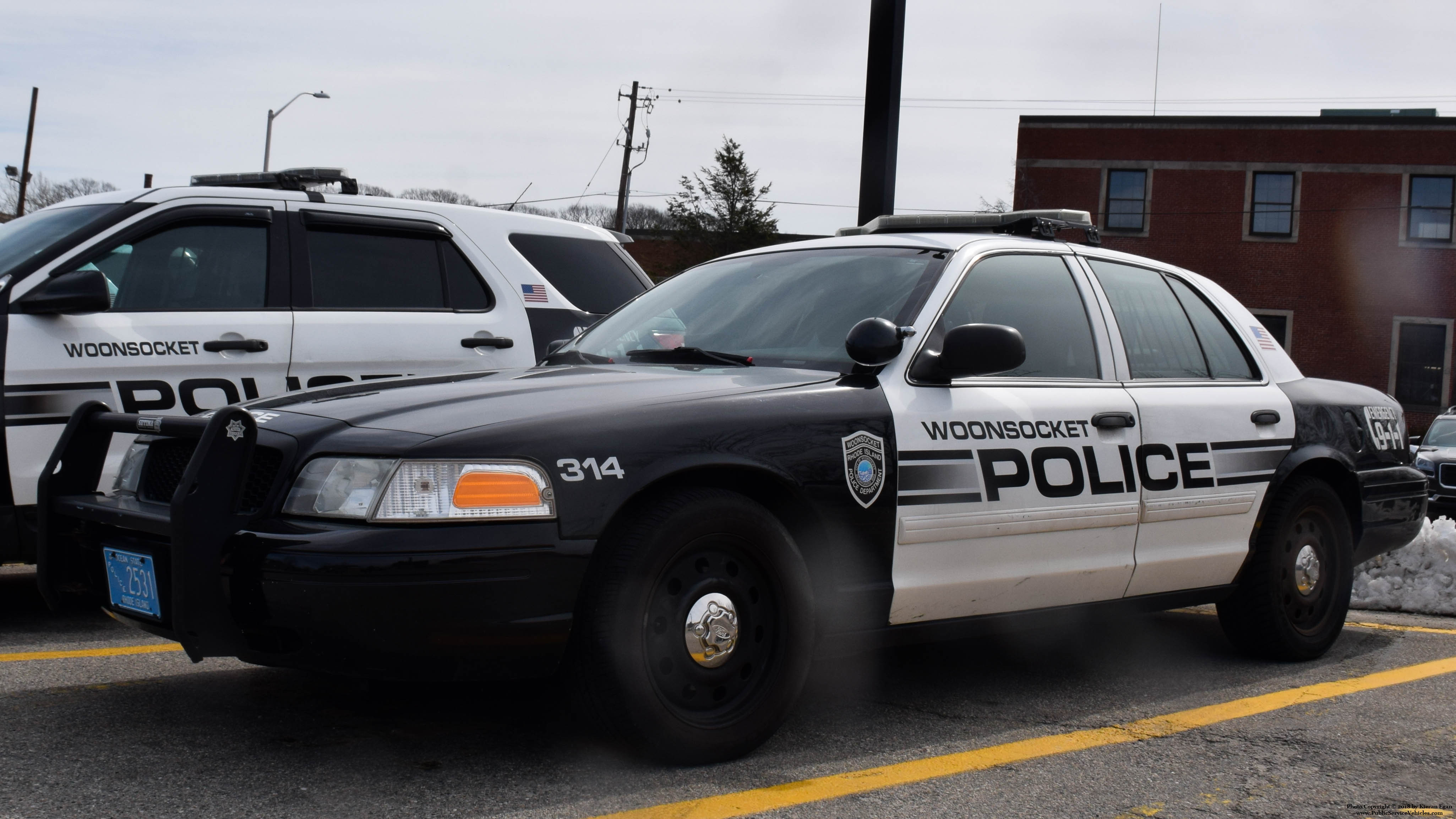 A photo  of Woonsocket Police
            Cruiser 314, a 2009-2011 Ford Crown Victoria Police Interceptor             taken by Kieran Egan