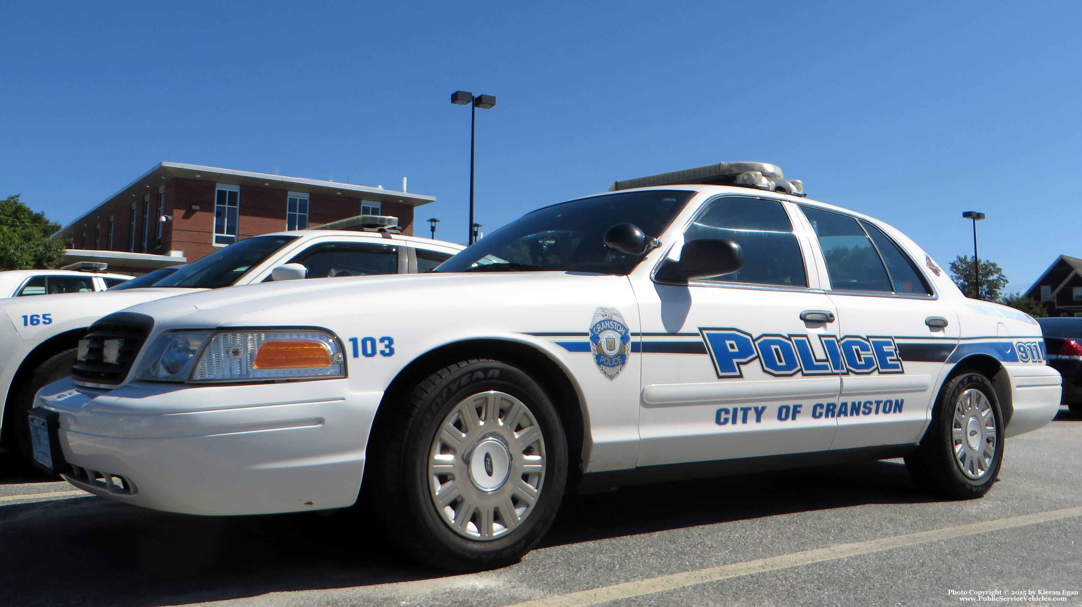 A photo  of Cranston Police
            Cruiser 103, a 2003-2005 Ford Crown Victoria Police Interceptor             taken by Kieran Egan