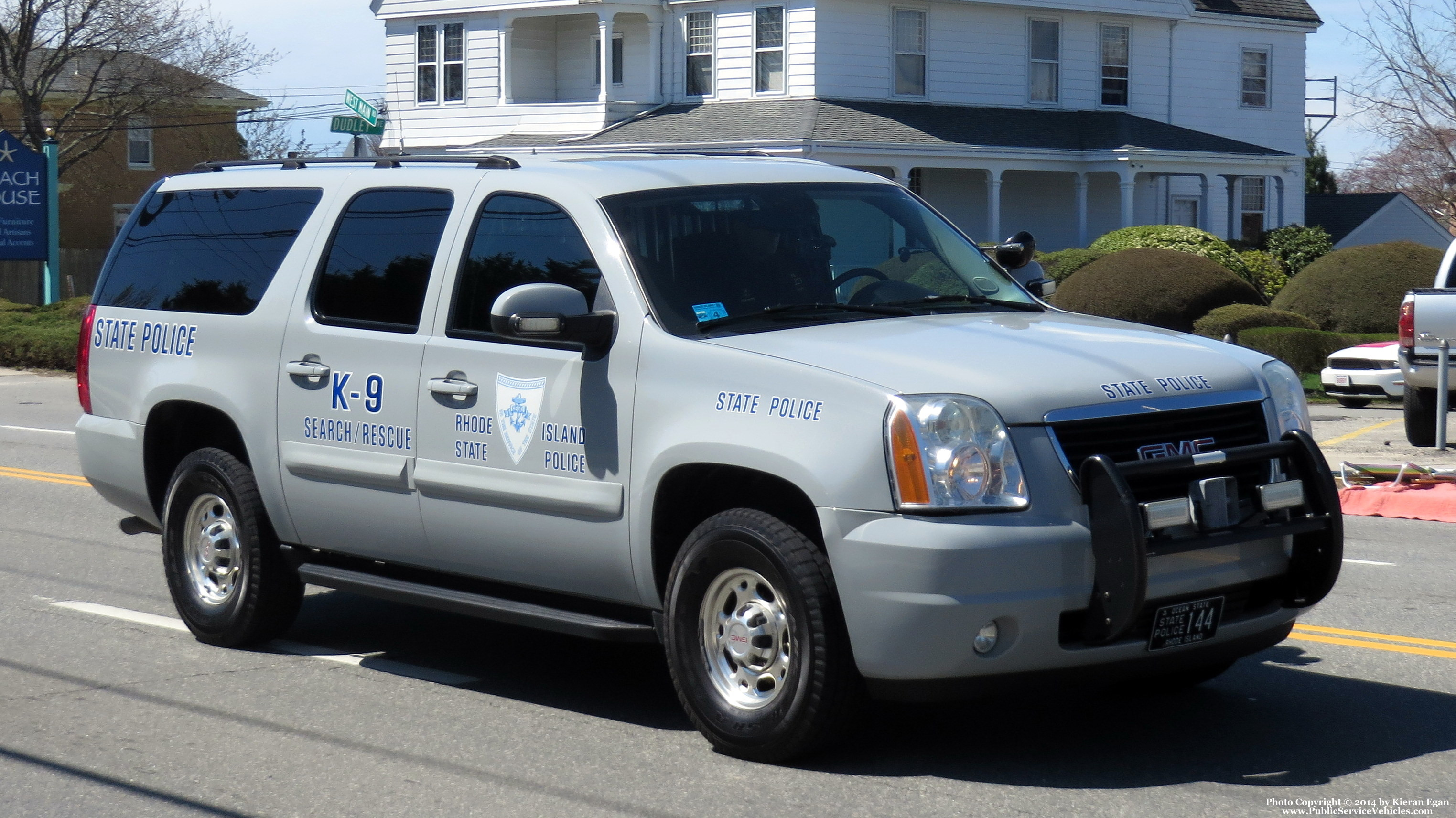 A photo  of Rhode Island State Police
            Cruiser 144, a 2007-2014 GMC Yukon XL             taken by Kieran Egan