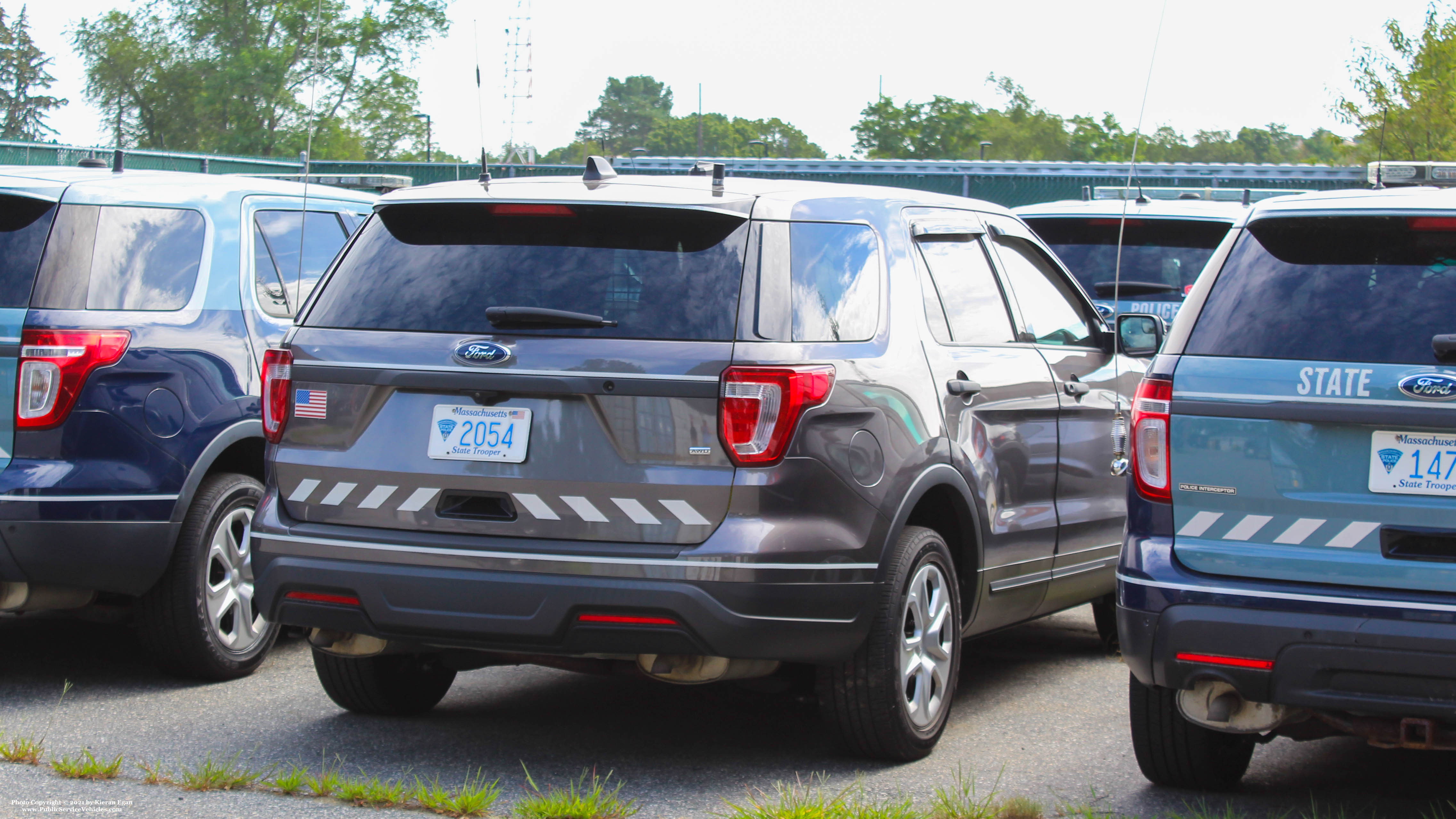 A photo  of Massachusetts State Police
            Cruiser 2054, a 2018 Ford Police Interceptor Utility             taken by Kieran Egan