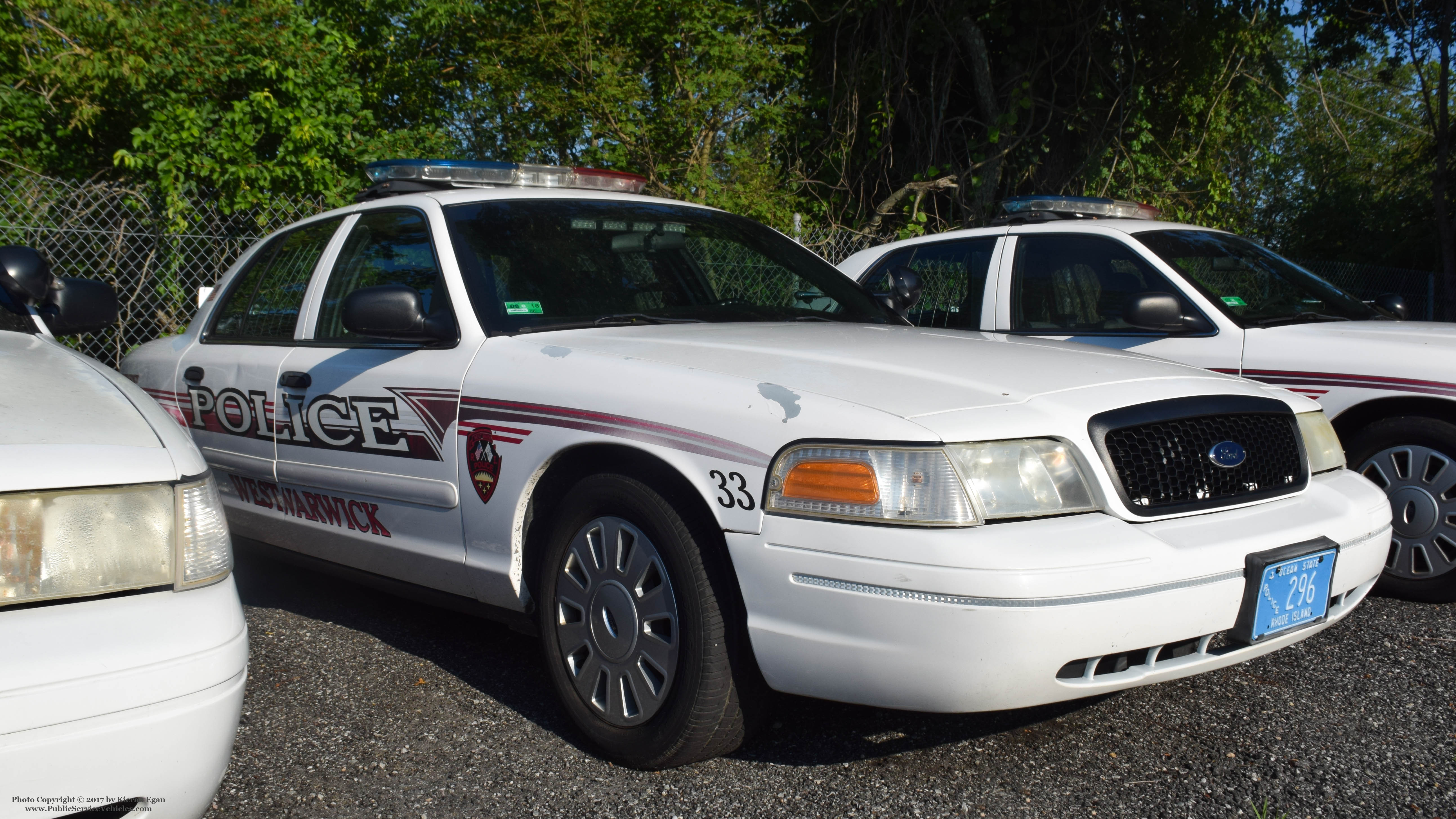 A photo  of West Warwick Police
            Car 33, a 2007 Ford Crown Victoria Police Interceptor             taken by Kieran Egan