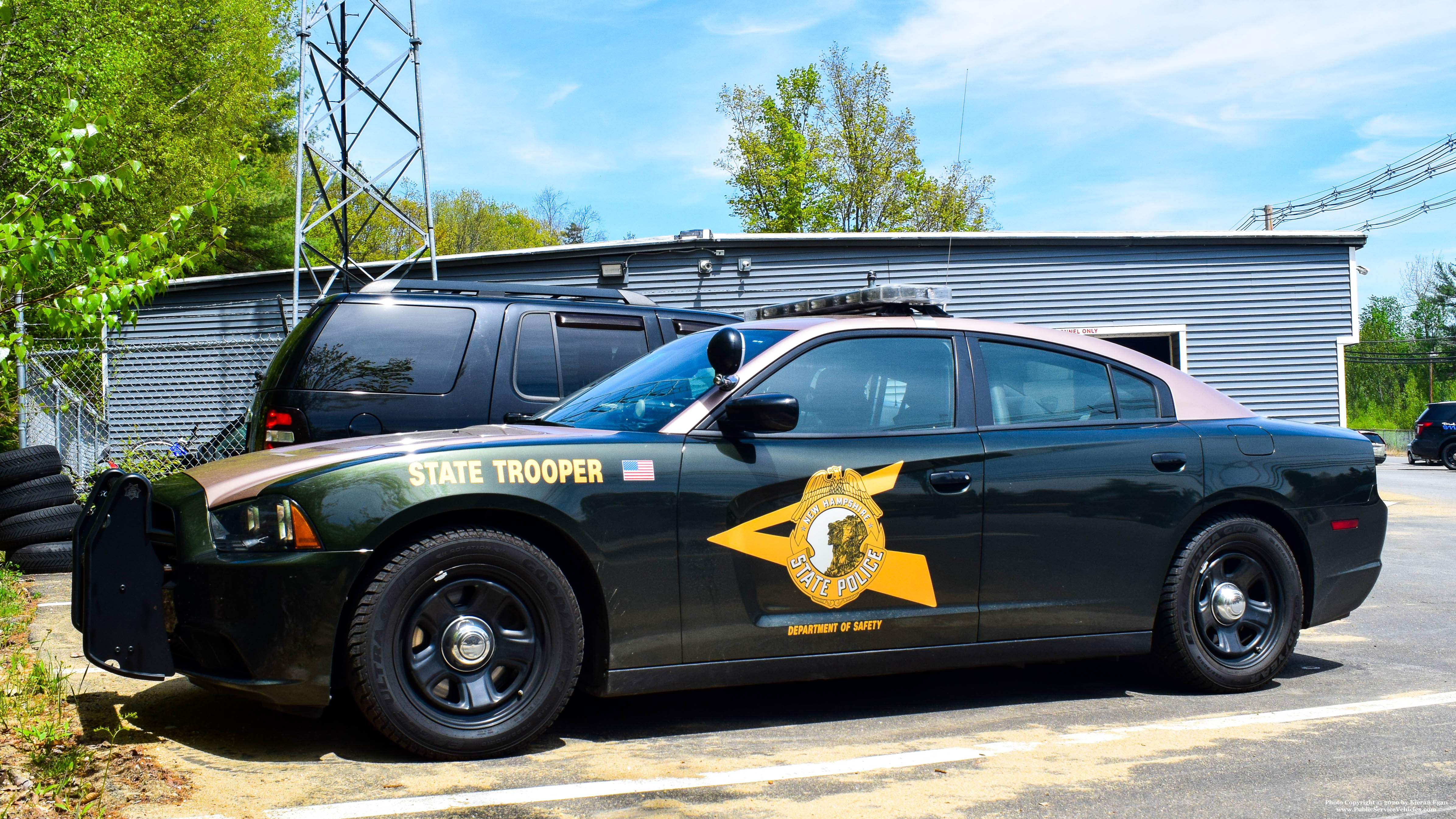 A photo  of New Hampshire State Police
            Cruiser 602, a 2011-2014 Dodge Charger             taken by Kieran Egan